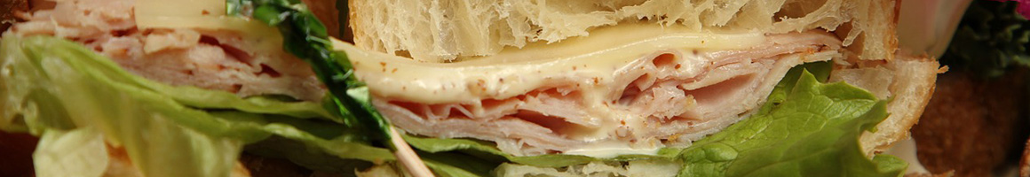 Eating Sandwich at La Bodega In Tremont restaurant in Cleveland, OH.